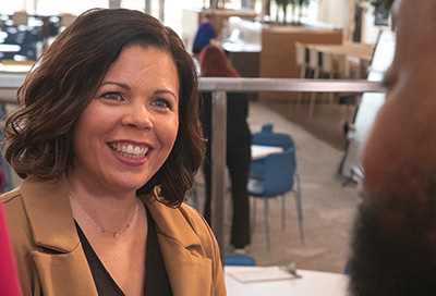 Photo of woman smiling in workplace