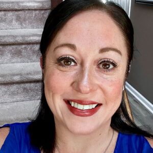 BMS employee Andria Armato's headshot. She is smiling and has dark brown hair.