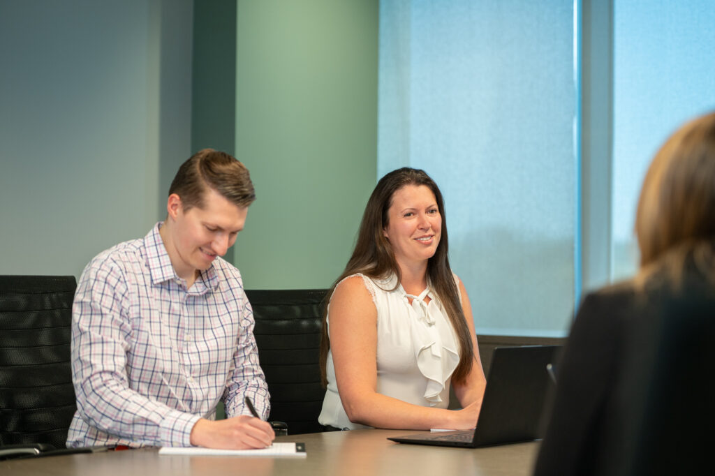 RayzeBio employees in a conference room