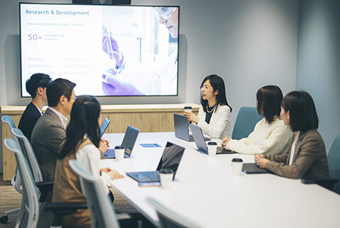 Photo of people in a conference room